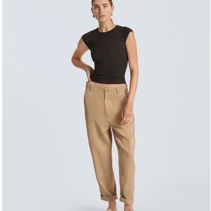 Never worn! No pets, non smoking household. Lyocell fabric, super soft chinos.